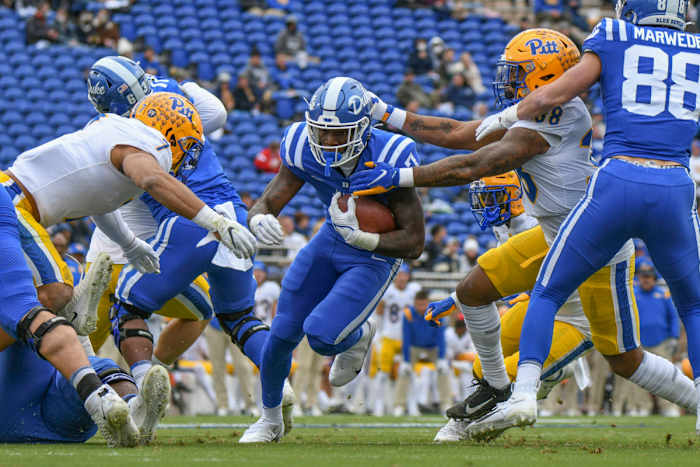 Duke running back carries the ball against Pitt